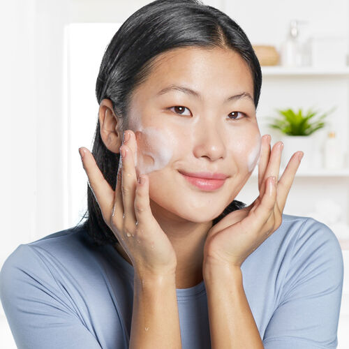 Woman using panthenol for skin