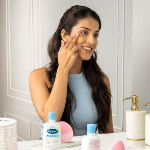 Woman applying Glycerin product to face